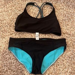 Girls ivivva brand reversible bathing duit. Size14